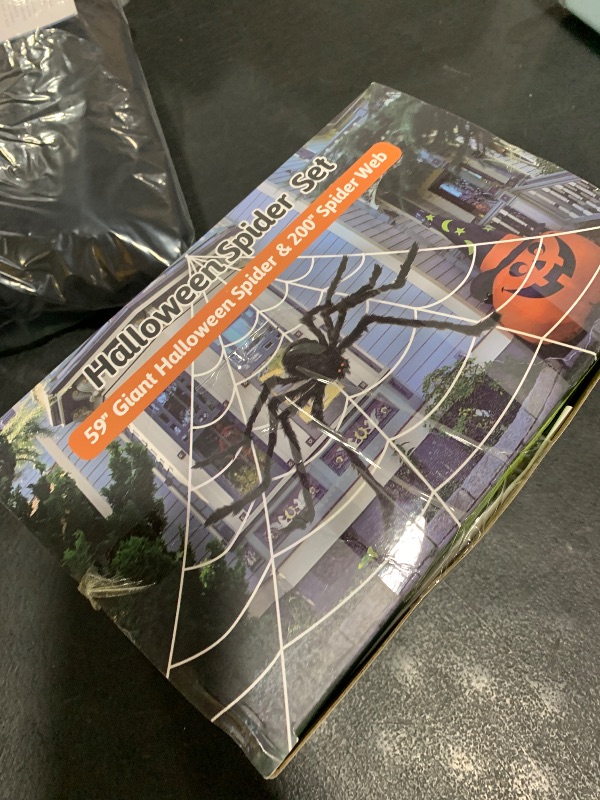 Photo 1 of OCATO 200" Halloween Spider Web + 59" Giant Spider Decorations Fake Spider with Triangular Huge Spider Web for Indoor Outdoor Halloween Decorations Yard Home Costumes Parties Haunted House Décor