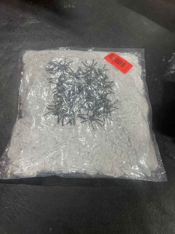 Photo 1 of 1000 sqft Spider Webs Halloween Decorations Bonus with 30 Fake Spiders, Super Stretch Cobwebs for Halloween Indoor and Outdoor Party Supplies