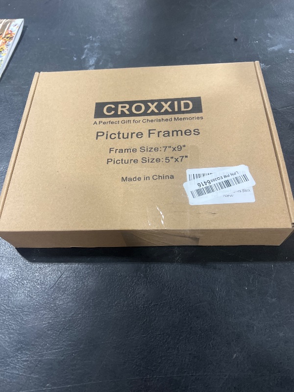 Photo 1 of CROXXID 5x7 Floating Picture Frames Set of 2, Made of Metal and Double Real Glass, for Photo Size up to 7x9, Tabletop Display Home or Wedding Decoration (Horizontal Black)
