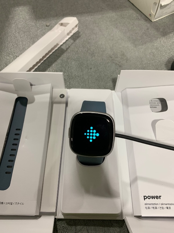 Photo 1 of Fitbit Versa 4 Fitness Smartwatch with Daily Readiness, GPS, 24/7 Heart Rate, 40+ Exercise Modes, Sleep Tracking and more, Waterfall Blue/Platinum, One Size (S & L Bands Included)