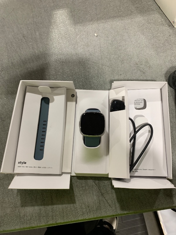 Photo 1 of Fitbit Versa 4 Fitness Smartwatch with Daily Readiness, GPS, 24/7 Heart Rate, 40+ Exercise Modes, Sleep Tracking and more, Waterfall Blue/Platinum, One Size (S & L Bands Included)