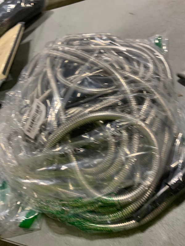 Photo 1 of SIXWOOD Metal Garden Hose 100FT, Stainless Water Hose with Adjustable Nozzle and 7 Pattern Sprayer, Heavy Duty Hoses for Yard, Outdoor - Flexible, Never Kink & Tangle, Puncture Resistant