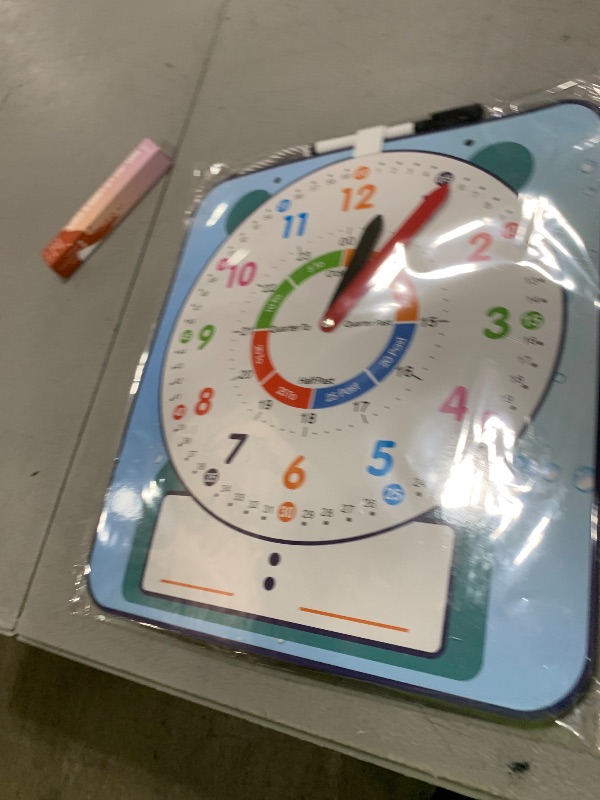 Photo 1 of ANCOMEDO Large 12" Magnetic Writable Dry Erase Teaching Clock with Pen,Teaching Demonstration Clock for Kids Learning Time with Cute Style for Home School Classroom Supplies(12" x 11")