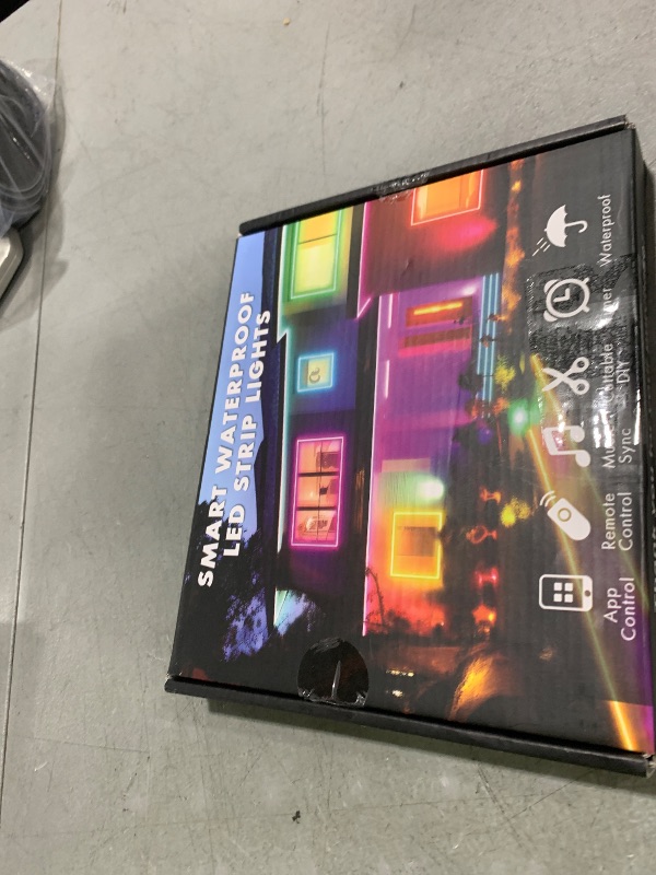 Photo 1 of 32FT Outdoor LED Strip Lights, IP68 RGB LED Lights with Remote and APP Control, Outdoor Strip Lights for Pool, Balcony, Roof, Garden, Stairs (1 Roll)