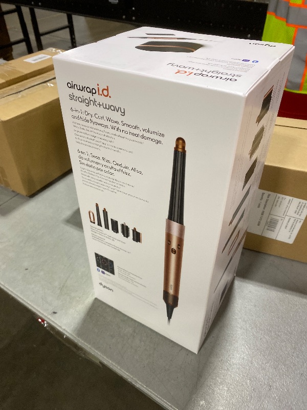 Photo 1 of Dyson Airwrap i.d. Multi-Styler and Dryer Straight+Wavy in Amber Silk
