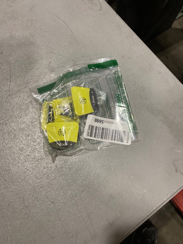 Photo 1 of 4-Pack replacement blades and 3 Guide Combs