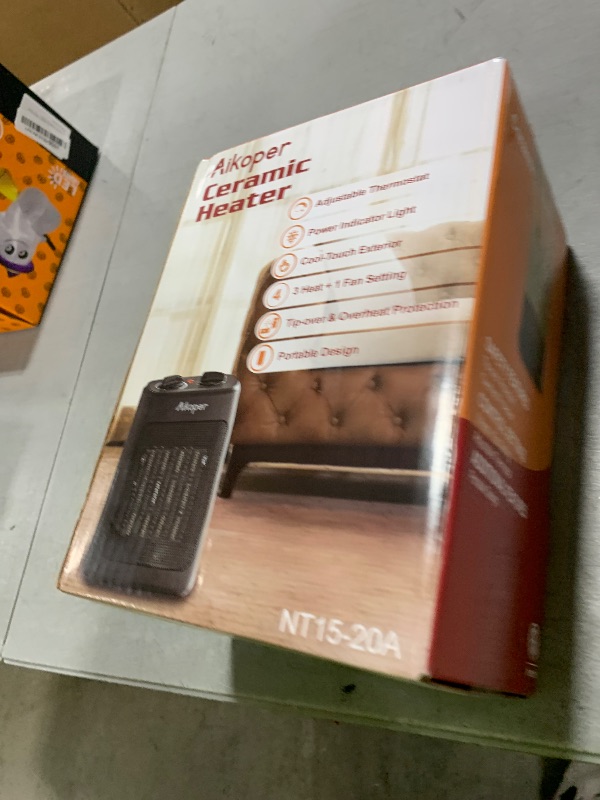 Photo 1 of Space Heater, 1500W Electric Heaters Indoor Portable with Thermostat, PTC Fast Heating Ceramic Room Small Heater with Heating and Fan Modes for Bedroom, Office and Indoor Use