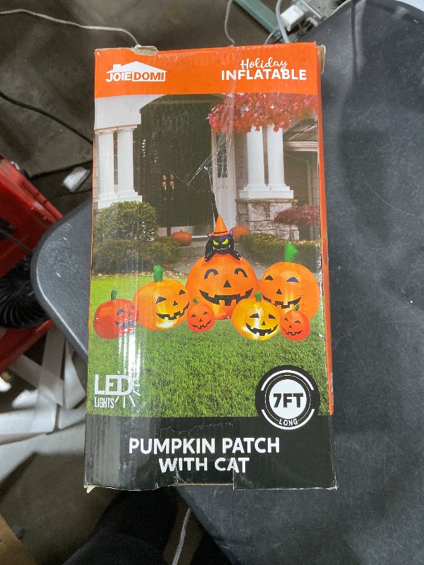 Photo 1 of Joiedomi 7 FT Long Halloween Inflatables Pumpkin Outdoor Decorations, 7 Pumpkins Outside Decoration with Witch's Cat with Build-in LEDs Blow Up Inflatables for Party Yard Lawn Garden Decor