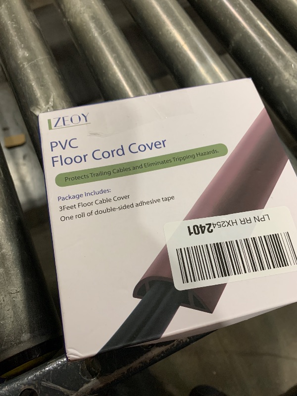 Photo 1 of 3FT PVC Cord Hider, Black Floor Cord Protector with 0.7 x 0.4 Inch Extension, Soft Wire Covers