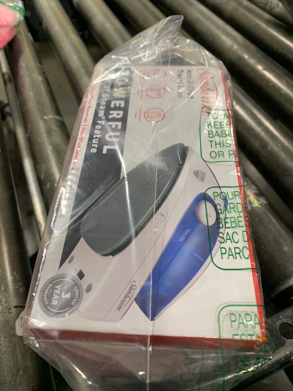 Photo 1 of Sunbeam Hot-2-Trot Travel Steam Iron, 800 Watt Dual Voltage 120/240, Compact Size, Portable, Non-Stick Soleplate, Soft Touch Handle, Horizontal or Vertical Use, White and Blue