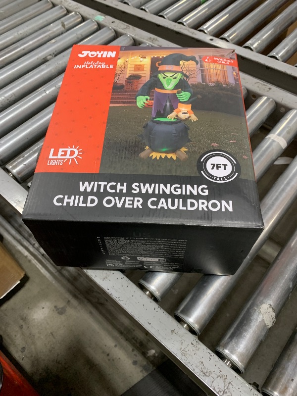Photo 1 of JOYIN 7FT Halloween Witch Animated Inflatable Decoration Witch Swinging Child Over Cauldron Inflatable Decoration Built in LED Giant Halloween Animatronics for Outdoor Garden Lawn Party Yard Decor