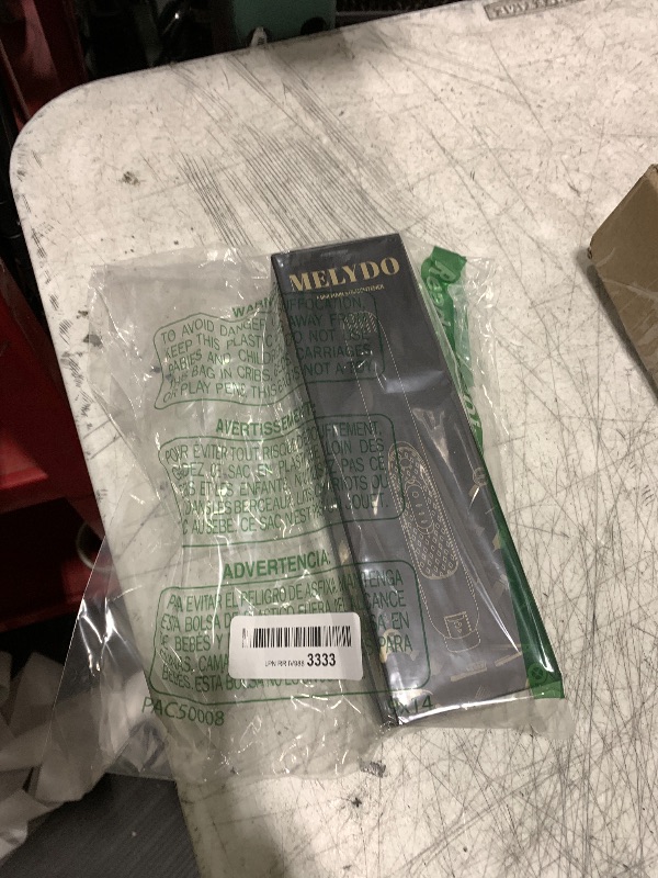 Photo 1 of MELYDO Mini Flat Iron, Ceramic Tourmaline Small Hair Straightener for Short Hair/Bangs, Dual Voltage Travel Hair Straightener, Portable Mini Straightener with Storage Pouch(Black)