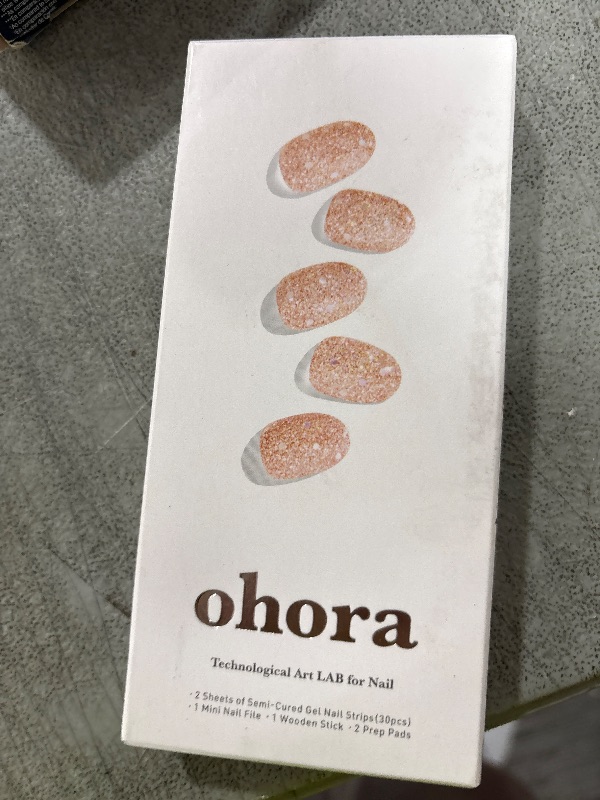 Photo 1 of ohora Semi Cured Gel Nail Strips (N Pixie Dust) - Nude, Glitter, Works with Any UV/LED Lamps, Salon-Quality, Long Lasting, Easy to Apply & Remove - Includes 2 Prep Pads, Nail File & Wooden Stick