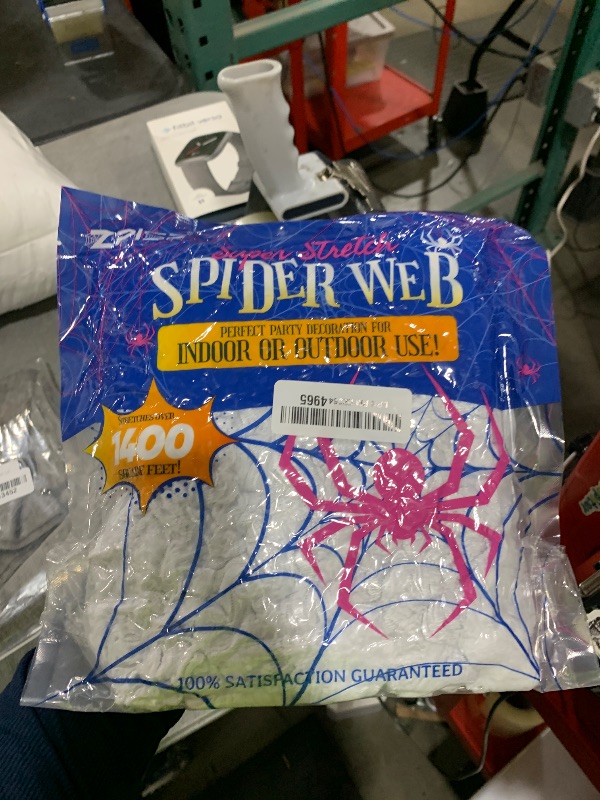 Photo 1 of 1400 sqft Halloween Spider Webs Decorations with 150 Extra Fake Spiders, Super Stretchy Cobwebs for Halloween Decor Indoor and Outdoor