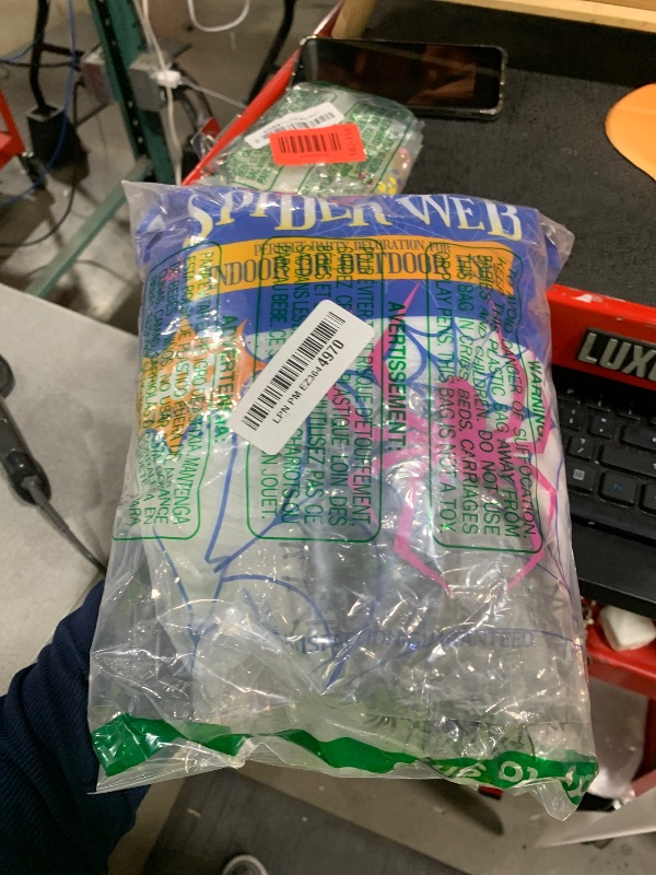 Photo 1 of 1400 sqft Halloween Spider Webs Decorations with 150 Extra Fake Spiders, Super Stretchy Cobwebs for Halloween Decor Indoor and Outdoor