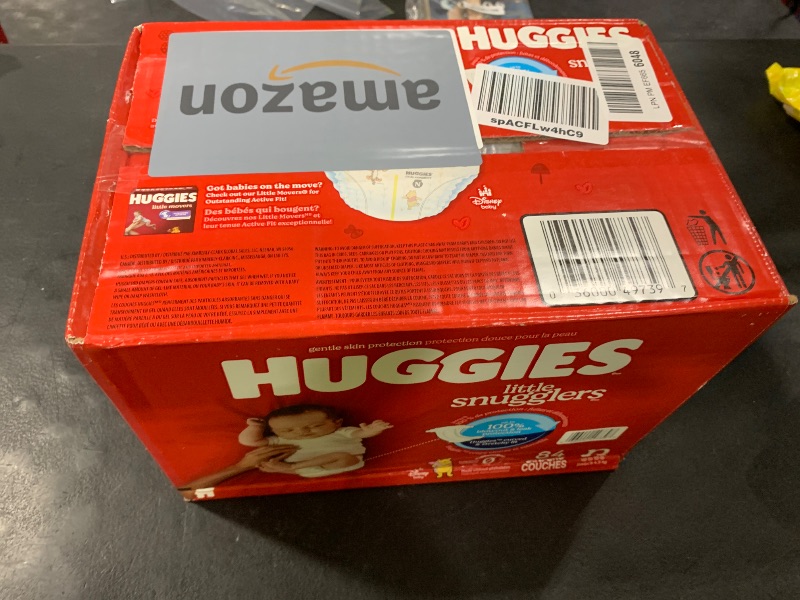 Photo 1 of Huggies Size Newborn Diapers, Little Snugglers Baby Diapers, Size Newborn (up to 10 lbs), 84 Count, Packaging May Vary