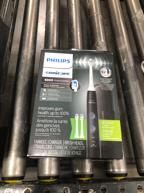 Photo 1 of Philips Sonicare ProtectiveClean 5300 Rechargeable Electric Toothbrush, with Pressure Sensor, 3 Cleaning Modes, SmarTimer and QuadPacer, with 2 Bonus Brush Heads, Travel Case, Black, Model HX6423/34