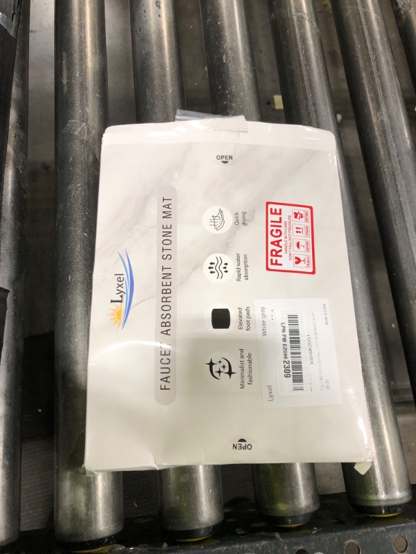 Photo 1 of Faucet Mat for Kitchen Sink with Raised Feet, Fast Drying Diatomite Stone Sink Tray, Water Absorbent Faucet & Sink Splash Guard, Prevents Moisture Buildup, Durable Protector for Bathroom Counter