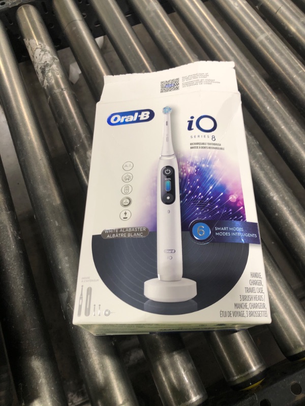 Photo 1 of Oral-B iO Series 8 Electric Toothbrush with 2 Replacement Brush Heads and Travel Case, Rechargeable Toothbrush, Whitealabaster