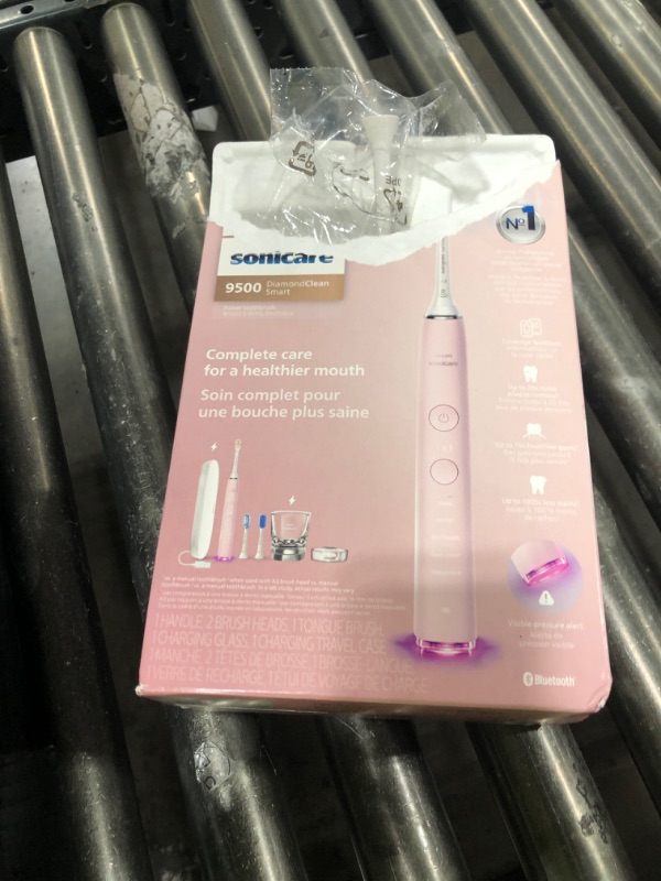 Photo 1 of Philips Sonicare DiamondClean Smart 9500 Electric Toothbrush, Sonic Toothbrush with App, Pressure Sensor, Brush Head Detection, 5 Brushing Modes and 3 Intensity Levels, Pink, Model HX9923/21