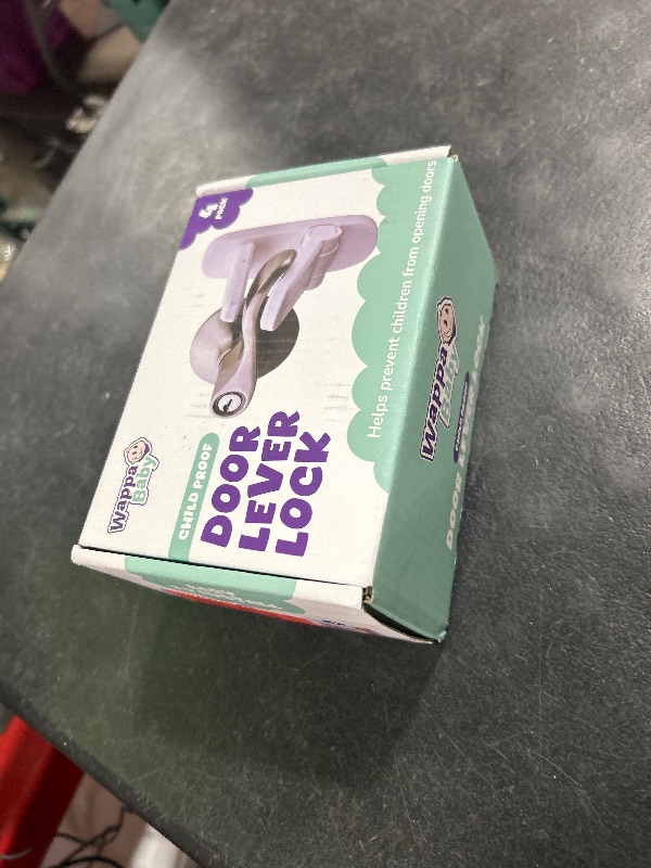 Photo 1 of Door Lever Locks (4 Pack) - Prevents Toddlers from Opening Doors - Durable ABS with 3M Adhesive - Easy One-Hand Operation for Adults, No Tools Needed