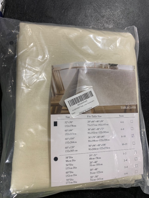 Photo 1 of AUSSPVOCT Textured Linen Tablecloth Rectangle 60x104 Water Resistant Spill-Proof Wipeable Ivory Table Cloth Wrinkle Free Fabric Dining Table Cover for Birthday Party Farmhouse Kitchen Tablecloths