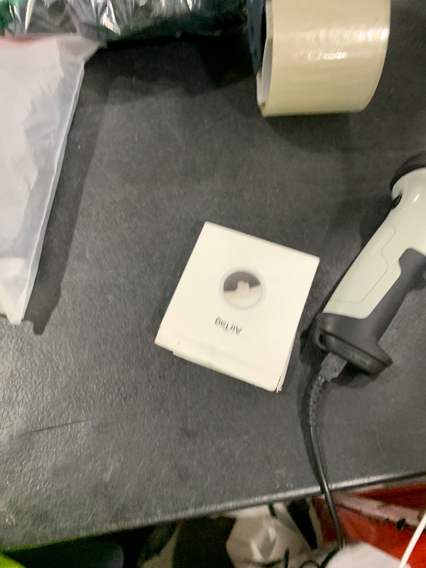 Photo 1 of Apple AirTag. Keep Track of and find Your Keys, Wallet, Luggage, Backpack, and More. Simple one-tap Set up with iPhone or iPad
