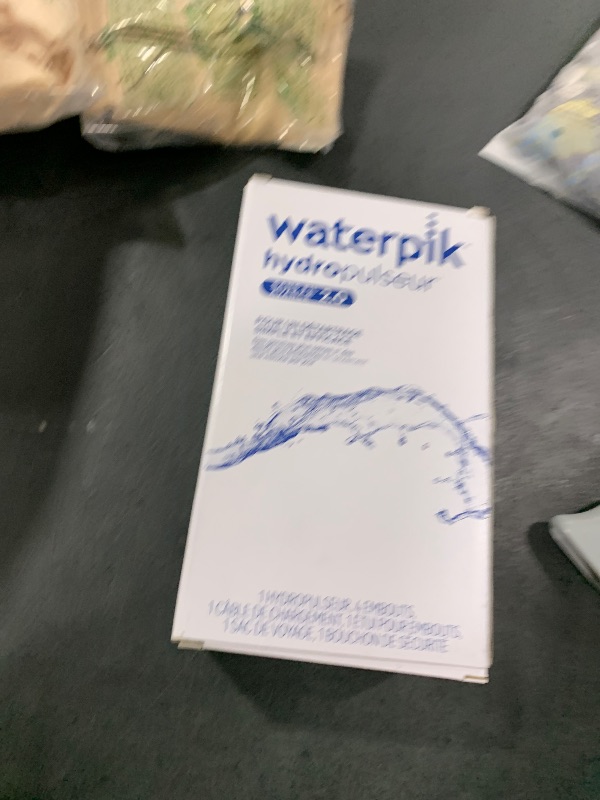 Photo 1 of Waterpik Cordless Advanced 2.0 Water Flosser For Teeth, Gums, Braces, Dental Care With Travel Bag and 4 Tips, ADA Accepted, Rechargeable, Portable, and Waterproof, Gray WP-587, Packaging May Vary