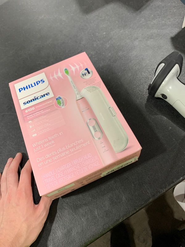 Photo 1 of Philips Sonicare ProtectiveClean 6100 Rechargeable Electric Toothbrush, with Pressure Sensor, 3 Cleaning Modes, SmarTimer and QuadPacer, 14-Day Battery Life, Travel Case, Pink, Model HX6876/21