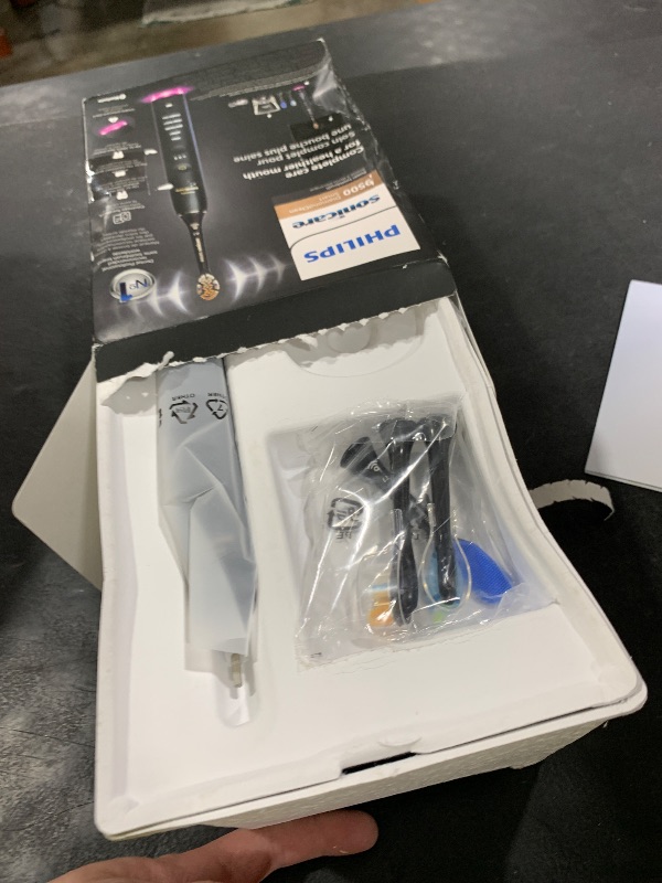 Photo 1 of Philips Sonicare DiamondClean Smart 9500 Electric Toothbrush, Sonic Toothbrush with App, Pressure Sensor, Brush Head Detection, 5 Brushing Modes and 3 Intensity Levels, Black, Model HX9923/11