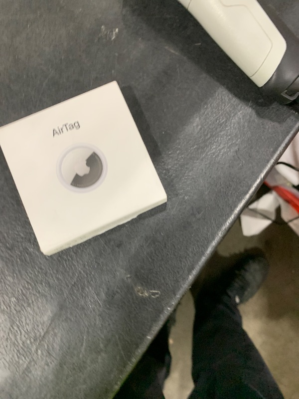 Photo 1 of Apple AirTag. Keep Track of and find Your Keys, Wallet, Luggage, Backpack, and More. Simple one-tap Set up with iPhone or iPad