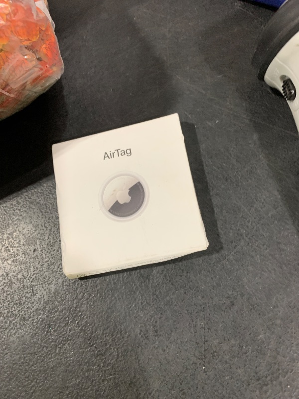 Photo 1 of Apple AirTag. Keep Track of and find Your Keys, Wallet, Luggage, Backpack, and More. Simple one-tap Set up with iPhone or iPad