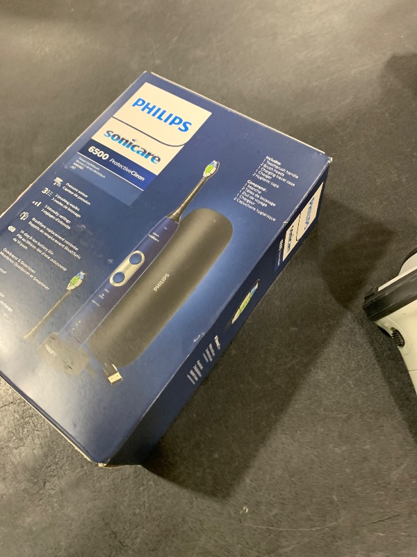 Photo 1 of Philips Sonicare ProtectiveClean 6500 Rechargeable Electric Toothbrush, with Pressure Sensor, 3 Cleaning Modes, SmarTimer and QuadPacer, 14-Day Battery Life, Charging Travel Case, Navy Blue, HX6462/07