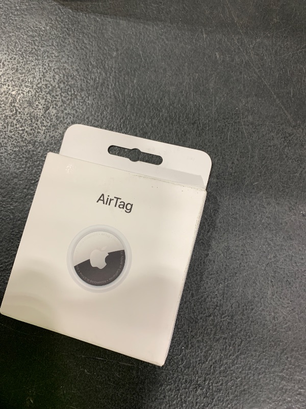 Photo 1 of Apple AirTag. Keep Track of and find Your Keys, Wallet, Luggage, Backpack, and More. Simple one-tap Set up with iPhone or iPad