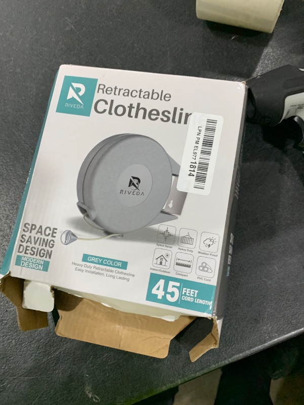 Photo 1 of Retractable Clothesline - Portable Heavy Duty Indoor and Outdoor Washing Line - 45 Feet PVC Retracting Clothes Line with Wall Mount Hang The Wet Dry Clothing Laundry - Easy Installation (Grey)