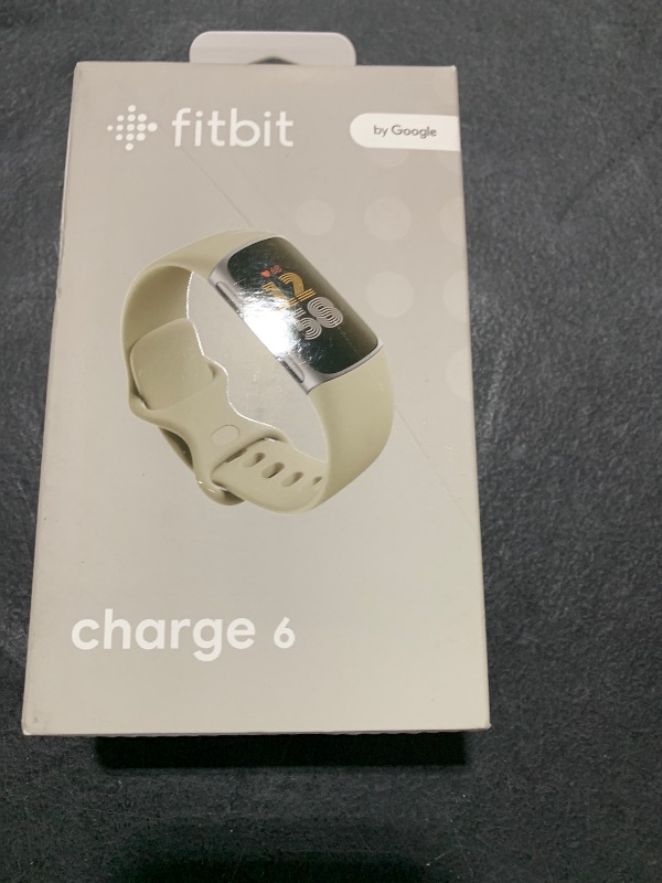 Photo 1 of Fitbit Charge 6 Fitness Tracker with Google apps, Heart Rate on Exercise Equipment, 6-Months Premium Membership Included, GPS, Health Tools and More, Porcelain/Silver, One Size (S & L Bands Included)