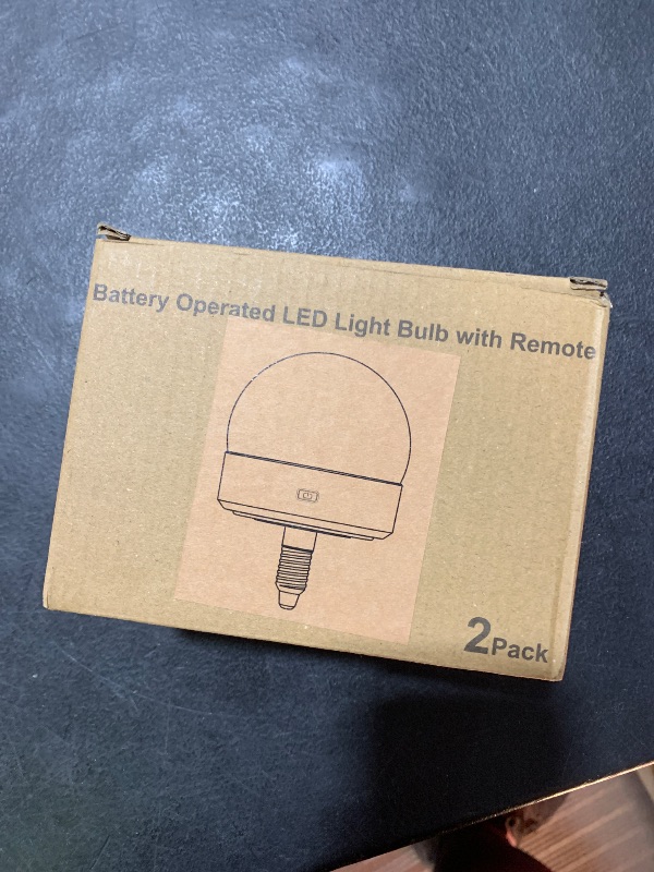 Photo 1 of Yochoice 2-Pack E12 Rechargeable Battery Operated Light Bulb with Remote, Dimmable LED Bulb with 15 Colors Selectable & 3 Timer, Wireless Detachable Puck Light Bulb for Wall Sconce, Non-Hardwired