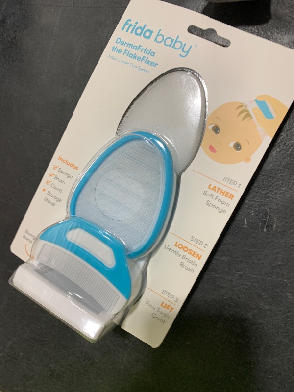 Photo 1 of Frida Baby The 3-Step Cradle Cap System, DermaFrida The FlakeFixer, Sponge, Brush, Comb and Storage Stand for Babies with Cradle Cap, White-Blue