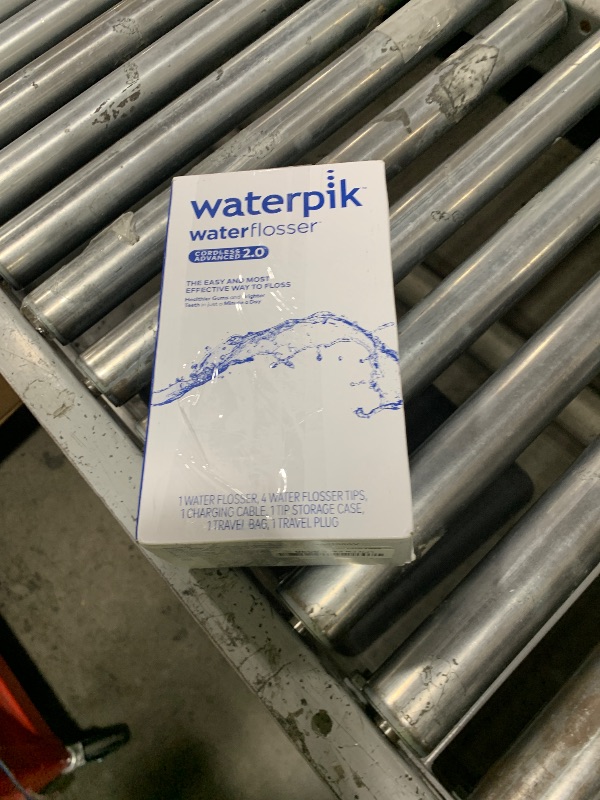 Photo 1 of Waterpik Cordless Advanced 2.0 Water Flosser For Teeth, Gums, Braces, Dental Care With Travel Bag and 4 Tips, ADA Accepted, Rechargeable, Portable, and Waterproof, White WP-580, Packaging May Vary