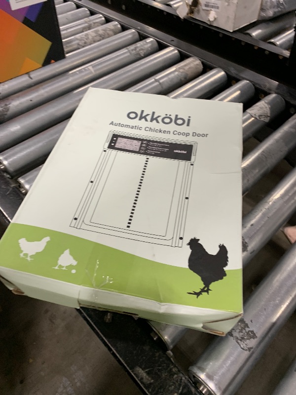 Photo 1 of Okkobi Automatic Chicken Coop Door Solar Powered - LCD Display - Chicken Coop Door with Remote Control, Light Sensor & Timer - Security & Peace of Mind: Anti-Pinch Function - 5-Year Protection - Grey