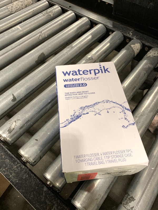 Photo 1 of Waterpik Cordless Advanced 2.0 Water Flosser For Teeth, Gums, Braces, Dental Care With Travel Bag and 4 Tips, ADA Accepted, Rechargeable, Portable, and Waterproof, Black WP-582, Packaging May Vary