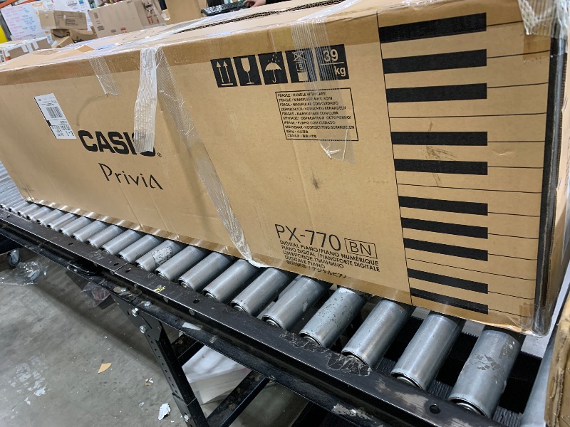 Photo 1 of Casio Privia PX-770 – 88-Key Weighted Console Digital Piano | Tri-Sensor II Scaled Hammer Action Keys | AiR Sound Source, 19 Tones, Concert Play, 16W Stereo Speakers, USB-MIDI | Elegant Brown Cabinet
