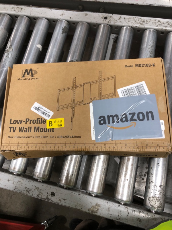 Photo 1 of Mounting Dream TV Mount Fixed for Most 42-84 Inch Flat Screen TVs, TV Wall Mount Bracket up to VESA 600 x 400mm and 132 lbs - Fits 16"/18"/24" Studs - Low Profile and Space Saving MD2163-K