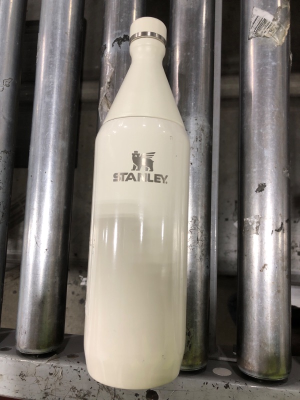 Photo 1 of Stanley All Day Slim Bottle 34 oz | Twist On Lid with Leakproof Seal | Slim Design for Travel & Gym | Insulated Stainless Steel | BPA-Free | Cream