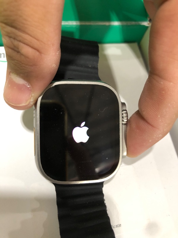 Photo 1 of Apple Watch Ultra [GPS + Cellular 49mm] Titanium Case with Midnight Ocean Band, One Size (Renewed Premium)