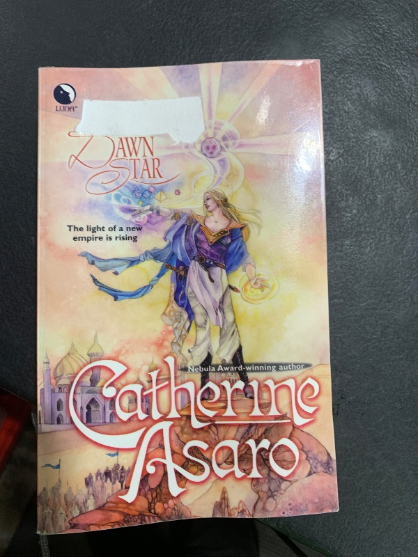 Photo 1 of The Dawn Star (Misted Cliffs, Book 3) Paperback – June 27, 2006 by Catherine Asaro (Author)