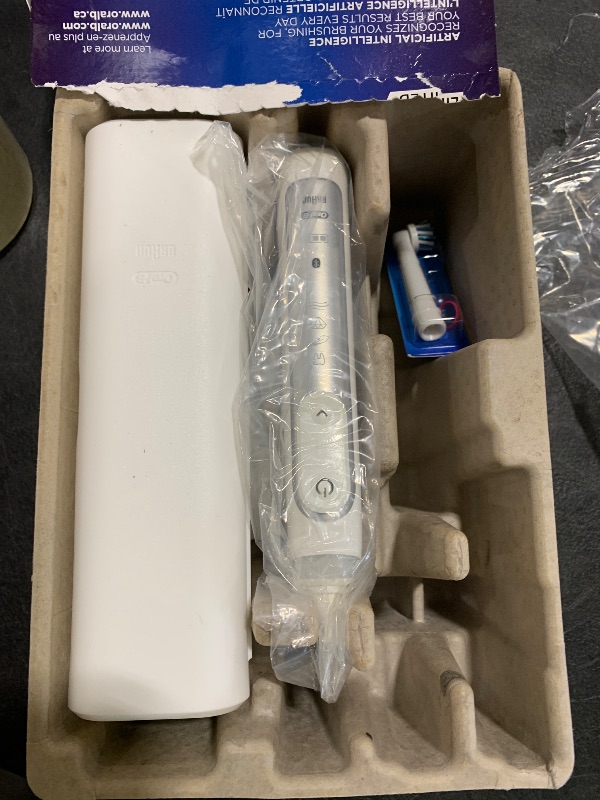 Photo 1 of Oral-B Genius X Limited Rechargeable Electric Toothbrush with 1 Replacement Brush Head, Travel Case, White