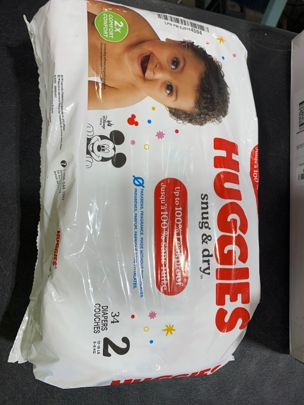 Photo 1 of Huggies Size 2 Diapers, Snug & Dry Baby Diapers, Size 2 (12-18 lbs), 34 Count, Packaging May Vary