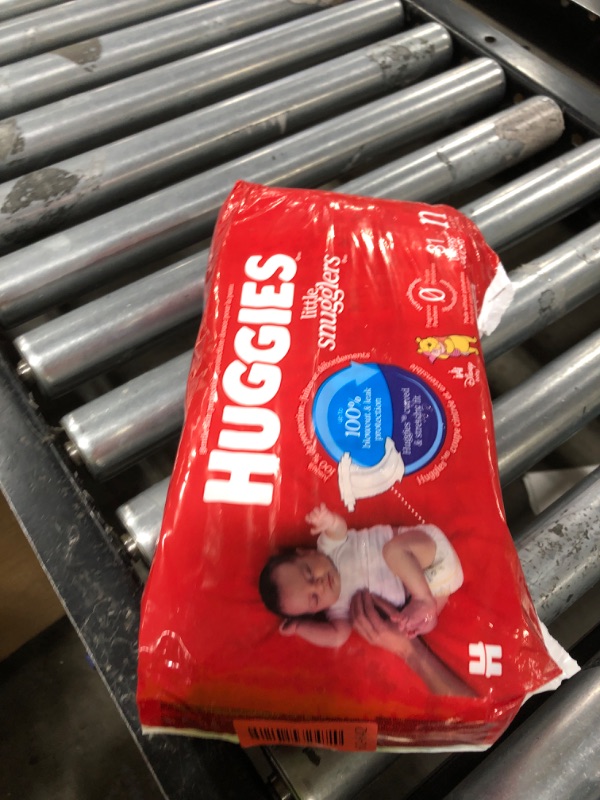 Photo 1 of Huggies Size Newborn Diapers, Little Snugglers Baby Diapers, Size Newborn (up to 10 lbs), 31 Count, Packaging May Vary