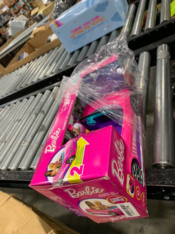 Photo 1 of Hot Wheels Barbie RC Toy Car, Remote-Control Pink Convertible, Can Hold 2 Barbie Fashion Dolls & Trunk Opens for Storage, Sticker Sheet for Customizing